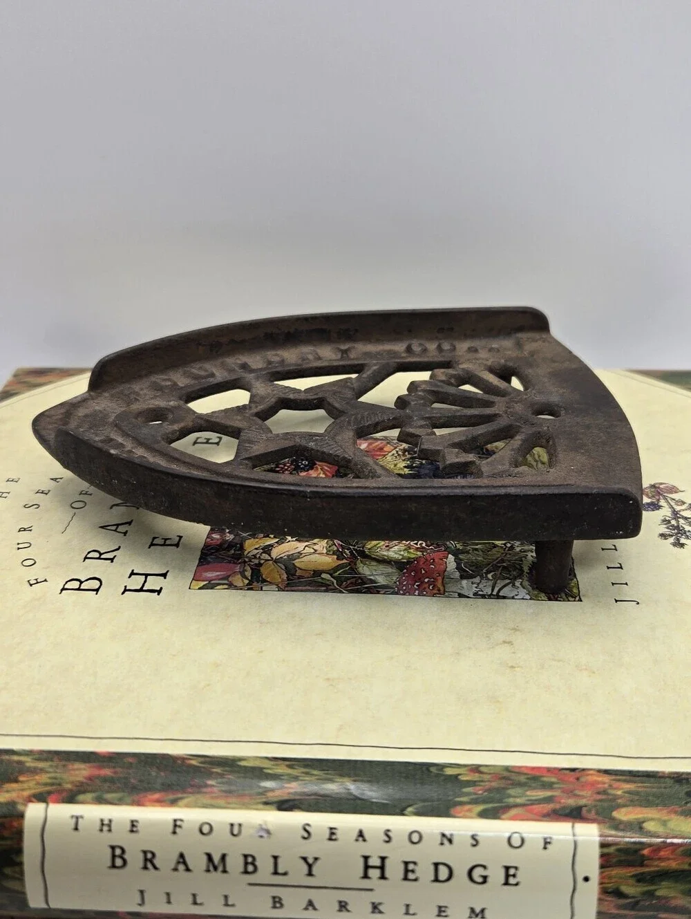 Antique Cast Iron Trivet Manufactured by The Cleveland Foundry Co. in Ohio.